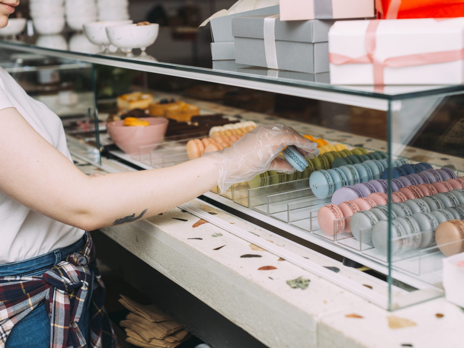 Anonymous woman with macarons